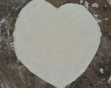 A picture of step 4 of Heart shaped paratha.