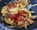 A picture of step 2 of Onion potato chips stir fry shak.