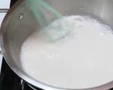 A picture of step 2 of Coconut And Thandai custard pudding.