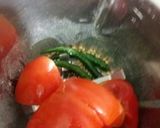 A picture of step 2 of Tomato Dosa.