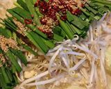 A picture of step 12 of Authentic Hakata-Style Soy Sauce Motsu Nabe at Home.