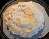 A picture of step 4 of Pavlova with lemon curd and strawberries.