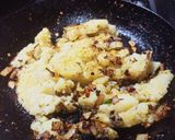 A picture of step 2 of Vada Pav /aloo chop burger.
