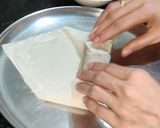 A picture of step 14 of Veg noodles spring rolls.