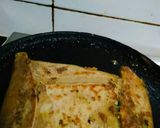 A picture of step 12 of Muglai egg paratha.
