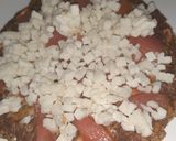 A picture of step 3 of Masala oats cheela pizza.
