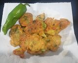 A picture of step 3 of Alu Hari pyaz k pakoray.