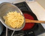 A picture of step 3 of Simple Penne with Tomato Sauce.