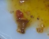 Foto del paso 4 de la receta: Aceite de ajo y ajíes P.P. (10 XL picante)