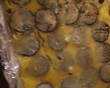 A picture of step 2 of Oreo cheesecake bars.