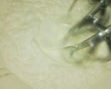 A picture of step 3 of White Chocolate Orange Mousse Parfat.