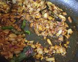 A picture of step 3 of Garlic masala rice.