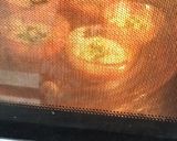 A picture of step 7 of Tuti fruity cup cakes.