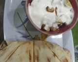 A picture of step 1 of Chopped Apple with cashew nuts, Almond nuts and yoghurt.