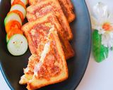 A picture of step 14 of Cheesy sausage sandwich.