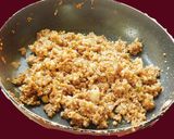 A picture of step 3 of Walnut coconut laddu.