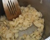 A picture of step 5 of Anti Vampire Cheese Sauce, with Onions and Garlic.