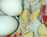 A picture of step 1 of Egg Onion pakoda.