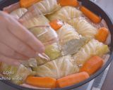 A picture of step 14 of Melts in Your Mouth! CABBAGE ROLLS.