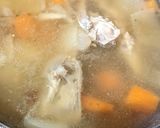 A picture of step 2 of Chicken bone carcass broth.