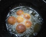 A picture of step 7 of Mawa Gulab Jamun from left over ghee residue.