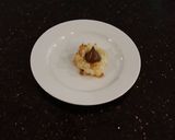 A picture of step 9 of Coconut Macaroon s with a Chocolate Center.