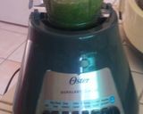 A picture of step 3 of A green koottu with Mung, green peas, and kale.