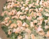 A picture of step 5 of Creamy spring onion prawns with parsley rice.