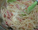 A picture of step 1 of Crab Stick & Onion Italian Pasta Salad.