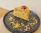 A picture of step 17 of Napoleon cake with crème anglaise and white chocolate cream.