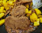 A picture of step 3 of Raw mango vaghariyu.