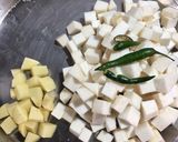 A picture of step 1 of Shola Kochur Dalna / Taro Root Curry.