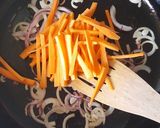 A picture of step 2 of Zuchinni Carrots Onion Stir Fry.