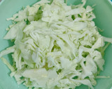 A picture of step 1 of Round cabbage with ham and onion.