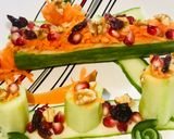 A picture of step 2 of Salad with richness of walnuts & dried cranberries.