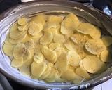 Une image de l'étape 6 de Gratin de pommes de terre façon dauphinoise à l'ail confit et deux fromages.