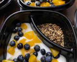A picture of step 2 of Easy blueberry and peach parfait.