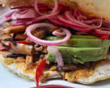 A picture of step 4 of Pita bread with pork and avocado.
