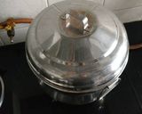 A picture of step 7 of Steamed Parle-g cake.