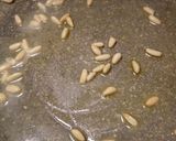 A picture of step 1 of Buttered wilted baby spinach.