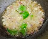 A picture of step 2 of Batata Kanda Poha.
