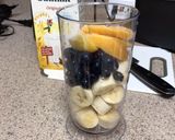 A picture of step 1 of Blueberry Peach Banana Smoothie 🍌🫐🍑.