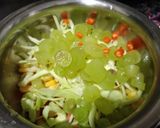 A picture of step 2 of Mix fruit and veg salad.