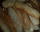 A picture of step 34 of Sugar coat khaja.