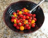 A picture of step 4 of Super Easy Roasted Lemon Dill Salmon with Basil Tomatoes.