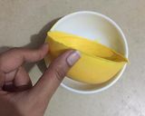A picture of step 1 of Ice cream with fruits in chocolate bowl.