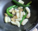A picture of step 2 of Raw Mango Thecha.