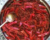 A picture of step 2 of Fresh Red Bullet chilli pickle.