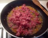 A picture of step 1 of Tagliatelle with Salamella Ragù, Pioppini Mushrooms, and Walnuts.