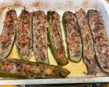Une image de l'étape 20 de Courgettes et poivrons farcis bœuf, tomates et oignon.